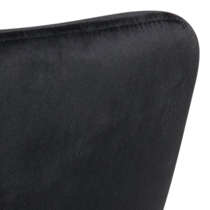 Close-up of a black cushion with a textured surface on a white background