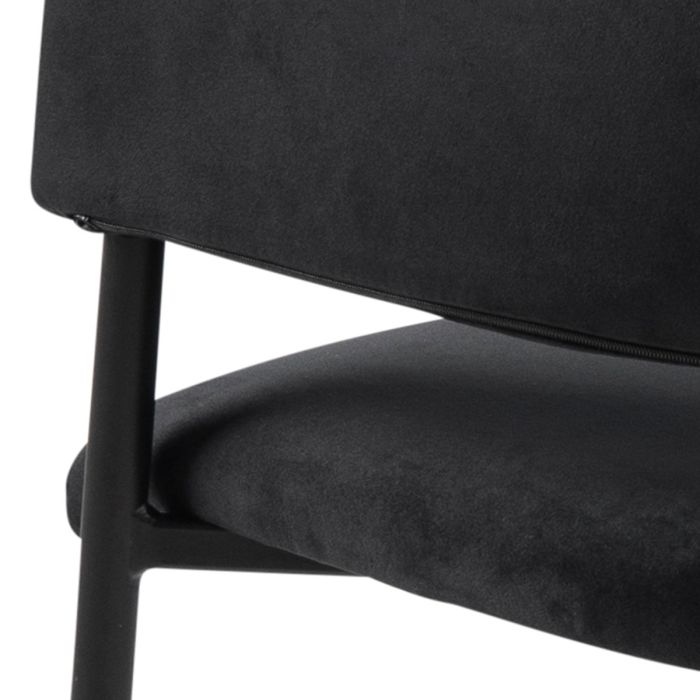 Close-up of a black chair with a white background