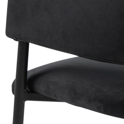 Close-up of a black chair with a white background