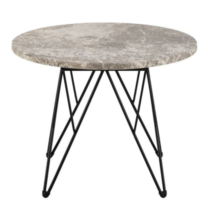 Round marble table with black metal legs on a white background