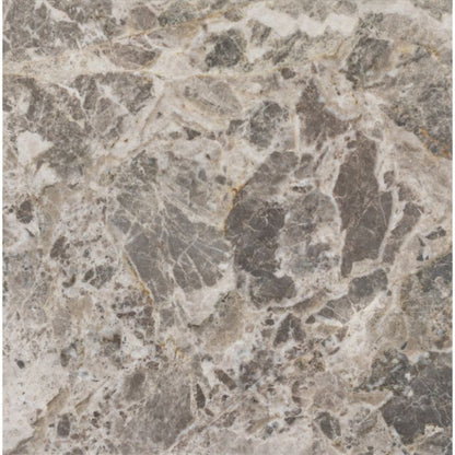 Close-up of a stone or marble surface with a natural pattern.