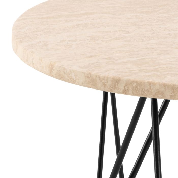 Round beige table with black metal legs on a white background