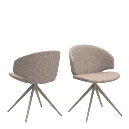 Two beige chairs with metal legs on a white background