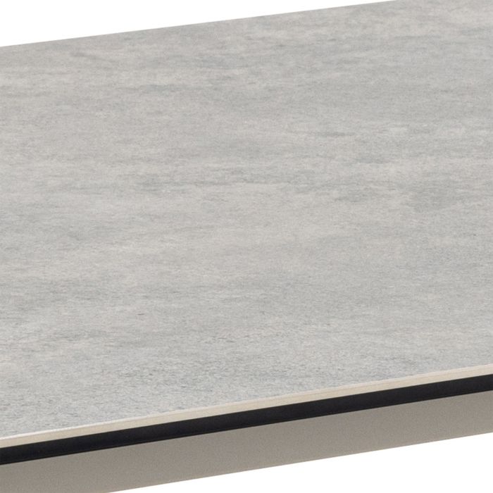 Close-up of a gray textured surface with a black border