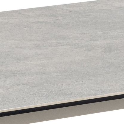 Close-up of a gray textured surface with a black border