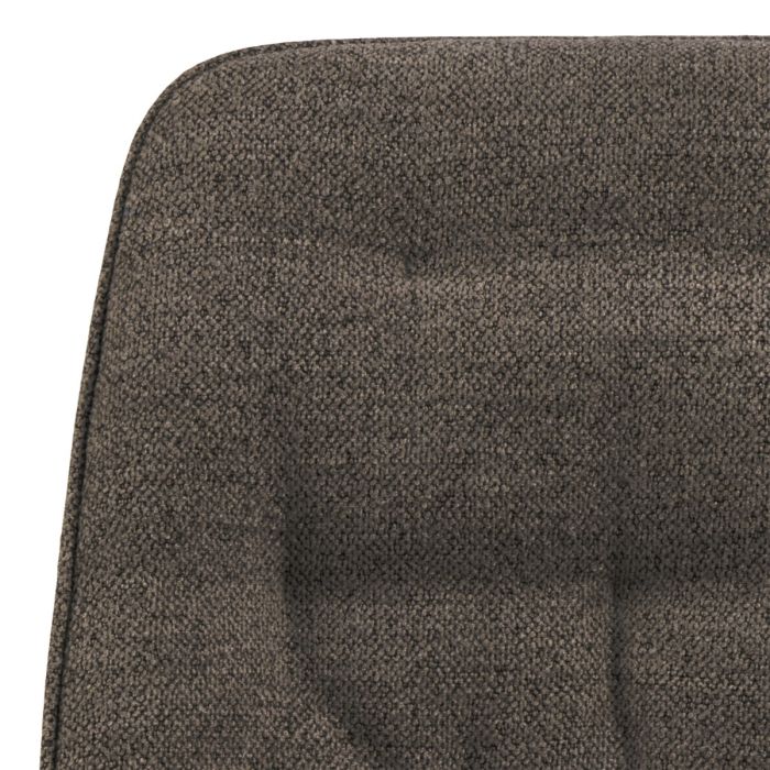 Close-up of a textured brown cushion on a white background