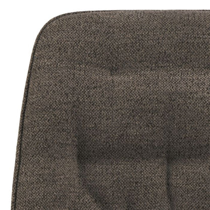 Close-up of a textured brown cushion on a white background