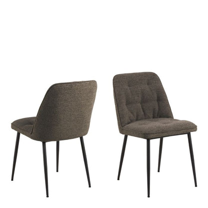 Two brown upholstered chairs with black legs on a white background