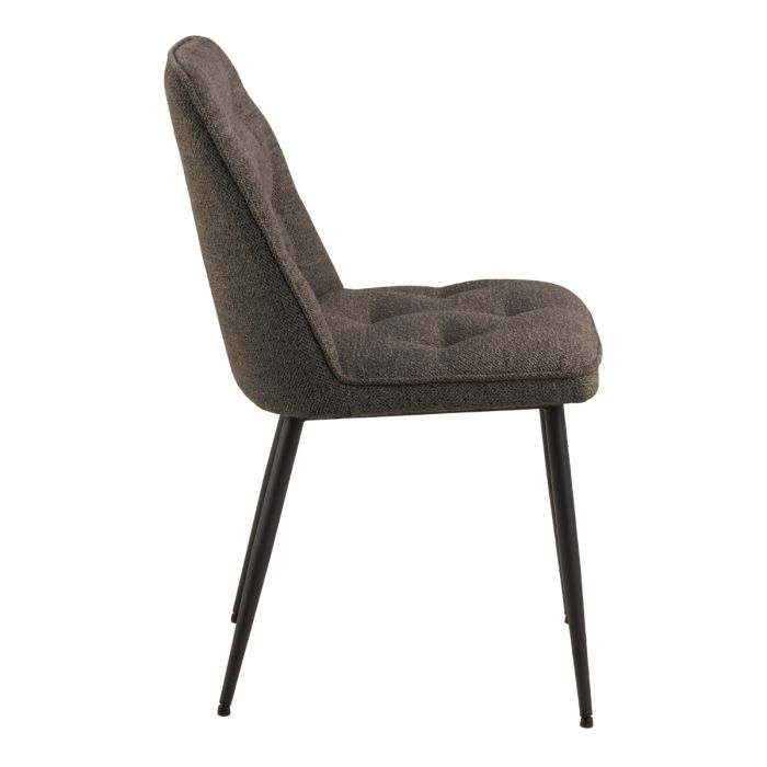 Brown upholstered chair with black legs on a white background