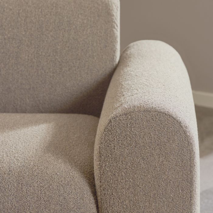 Close-up of a textured beige armchair