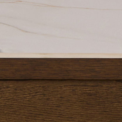 Close-up of a wooden surface with a marble-like pattern above it