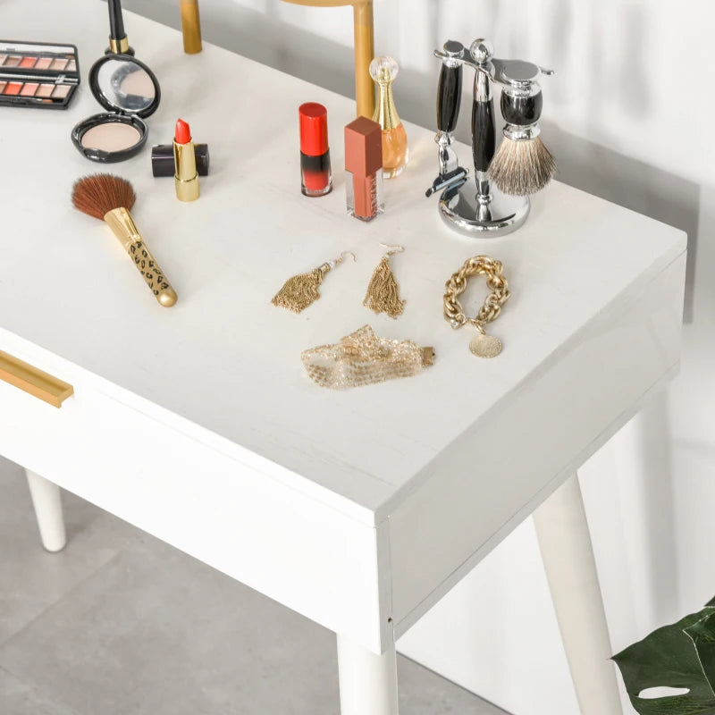 White table with makeup and jewelry items on a light background