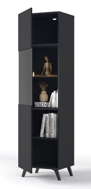 Black bookshelf with books and decorative items on a white background