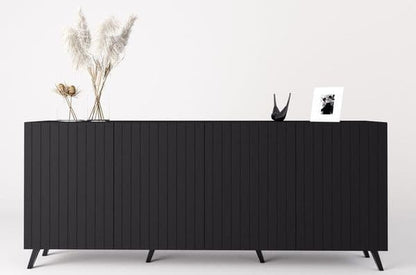 Black sideboard with decorative items on a white background