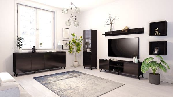 Modern living room with dark wood entertainment center and TV setup.