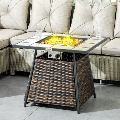 Outdoor patio table with fire pit feature in a garden setting