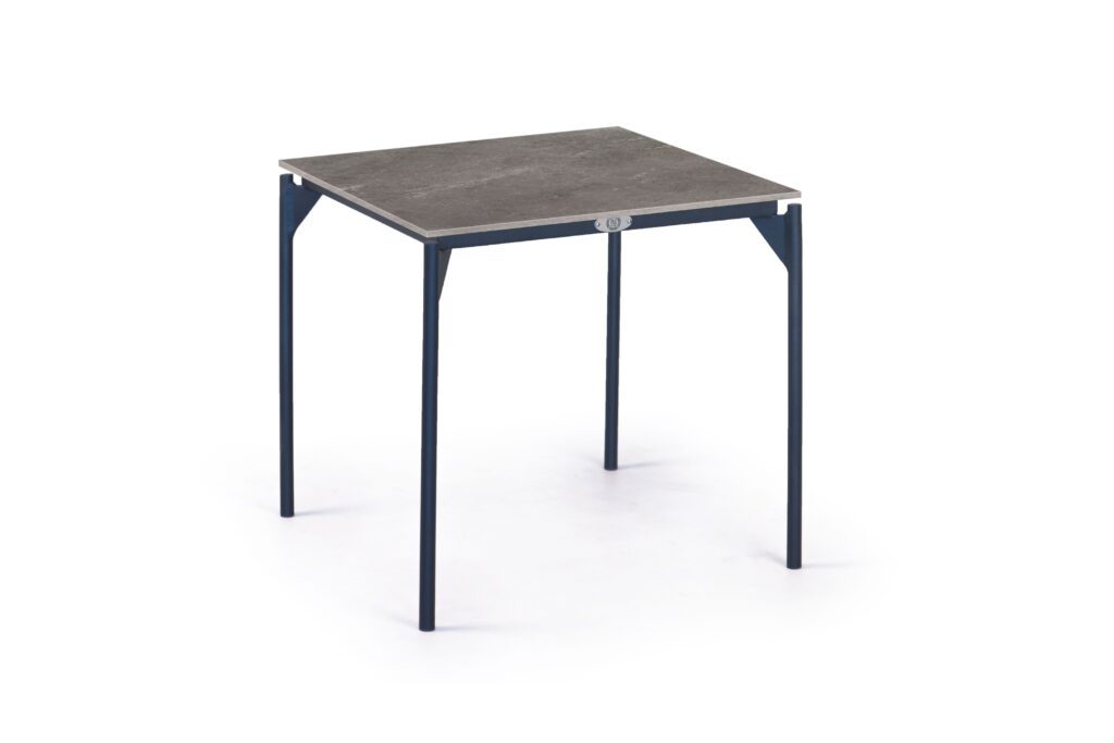 Table with a gray surface and black legs on a white background