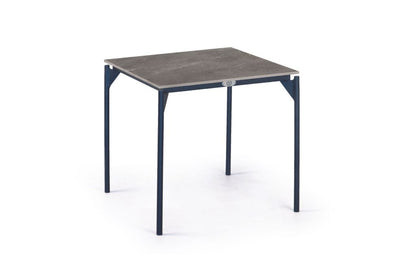 Table with a gray surface and black legs on a white background