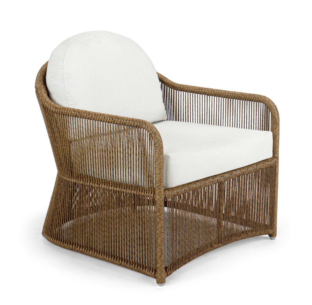 Wicker armchair with white cushion on a white background