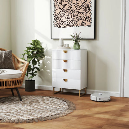 Modern living room with a white dresser, robot vacuum cleaner, and decorative elements.
