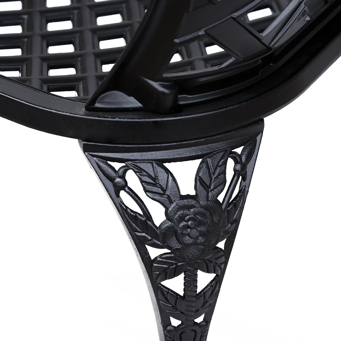 Close-up of a black metal decorative shelf bracket with intricate designs on a white background