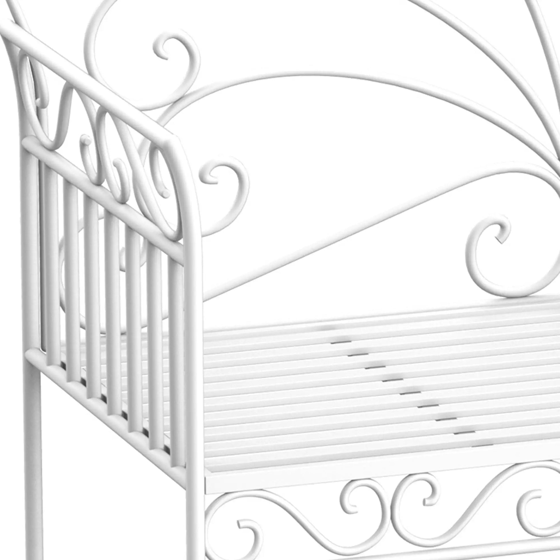 White metal crib with decorative elements on a white background