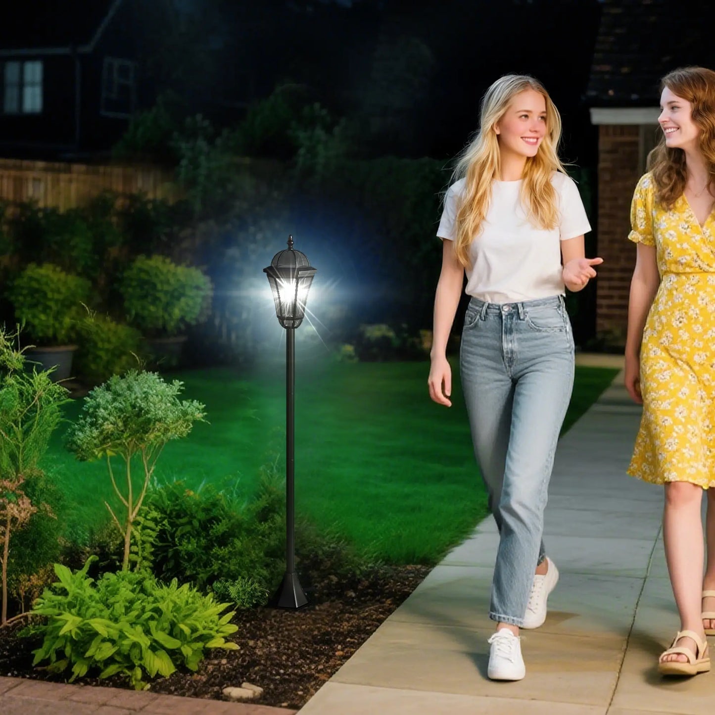 Two women walking outdoors near a solar lamp post in a garden setting.