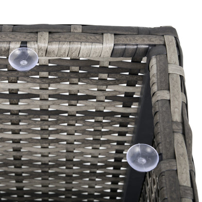 Wicker chair with clear suction cups attached to it on a white background