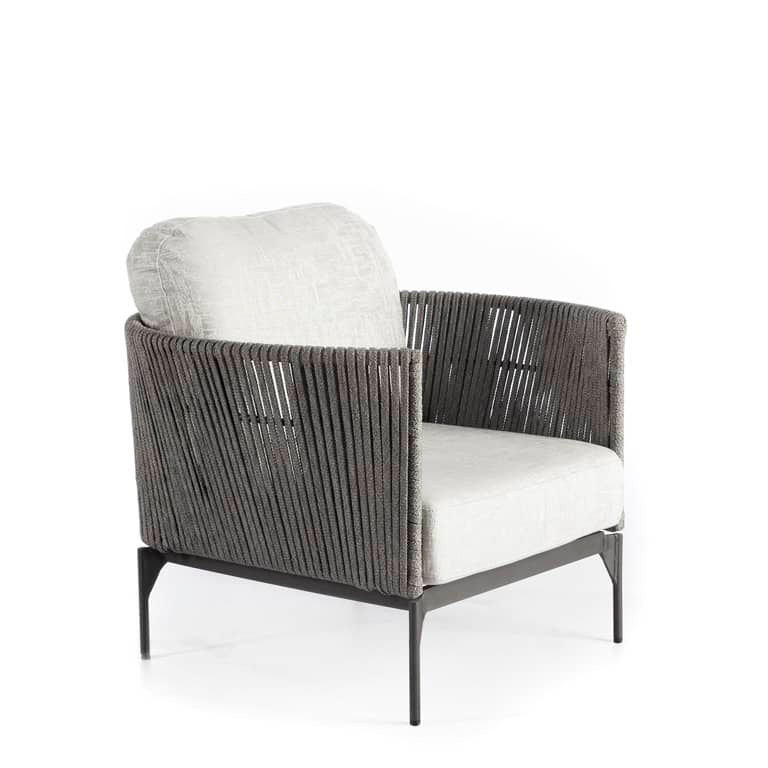 Chair with woven backrest and white cushion on a white background