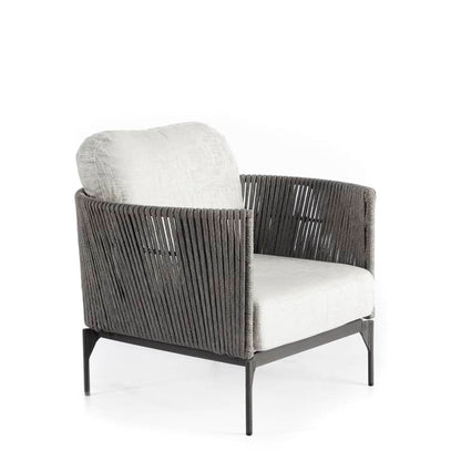 Chair with woven backrest and white cushion on a white background