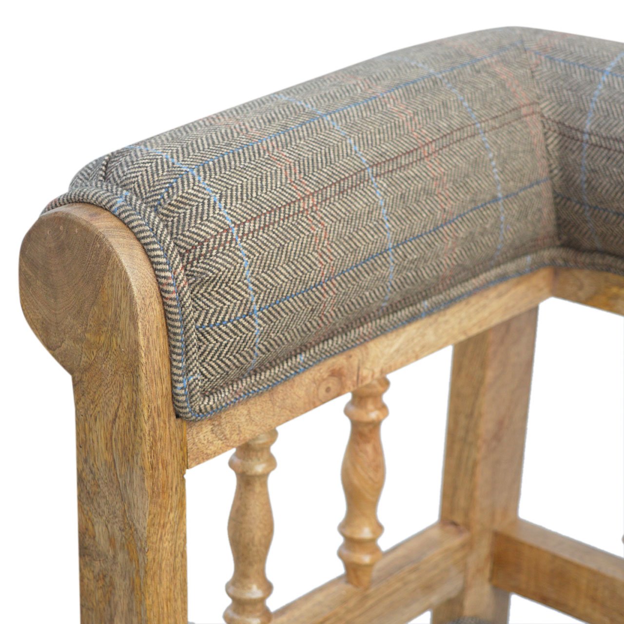Wooden bench with herringbone patterned cushion on a white background