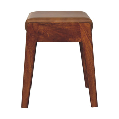Wooden stool with a brown cushioned seat on a white background
