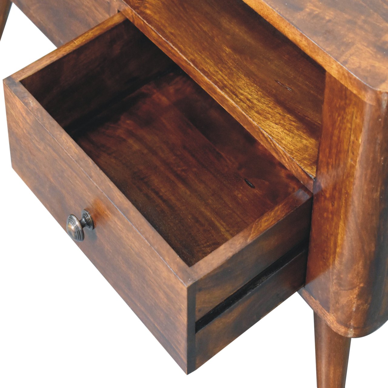 Wooden desk with an open drawer on a white background
