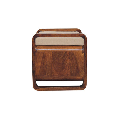 Wooden stool with a beige cushion on a white background