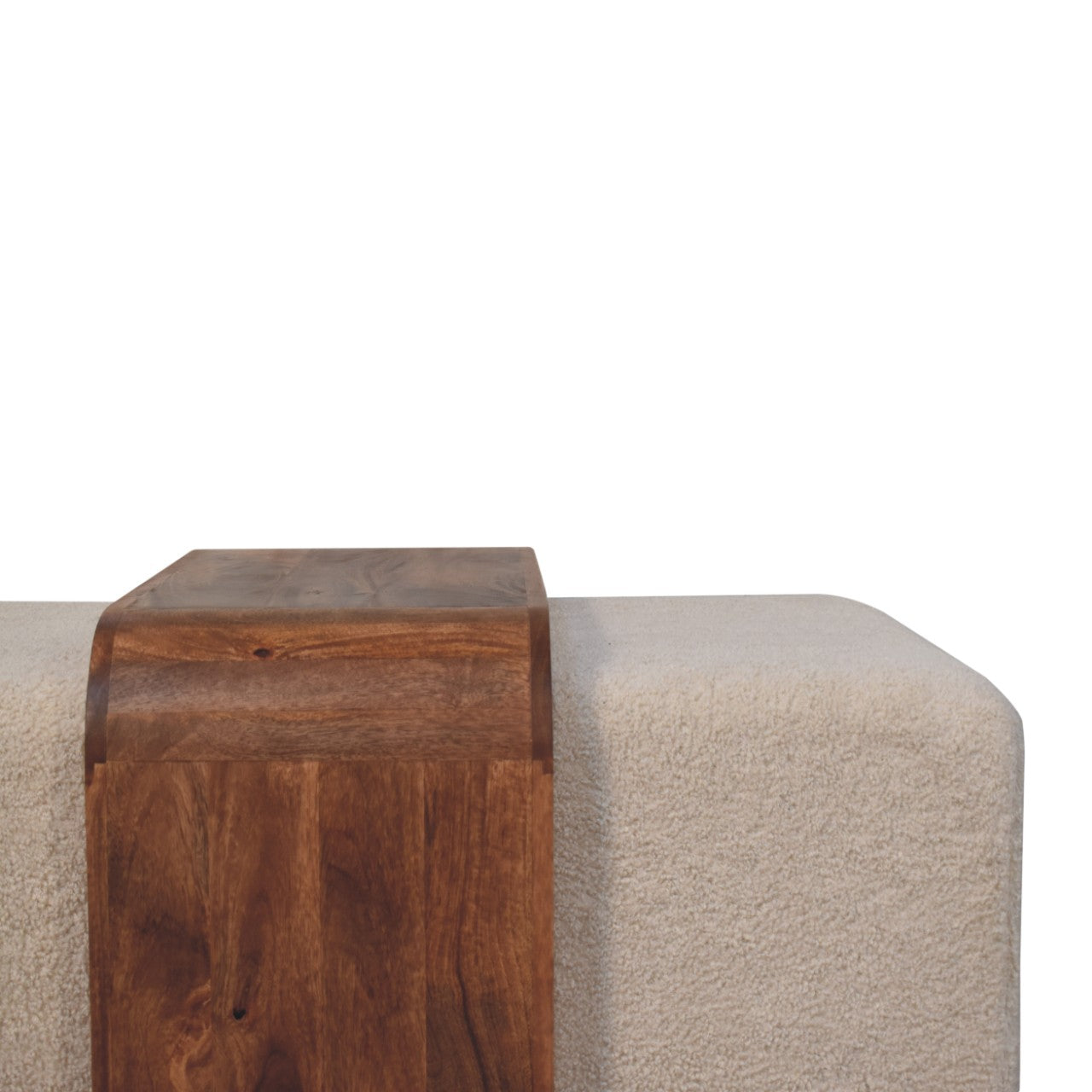 Wooden block on a textured surface with a white background