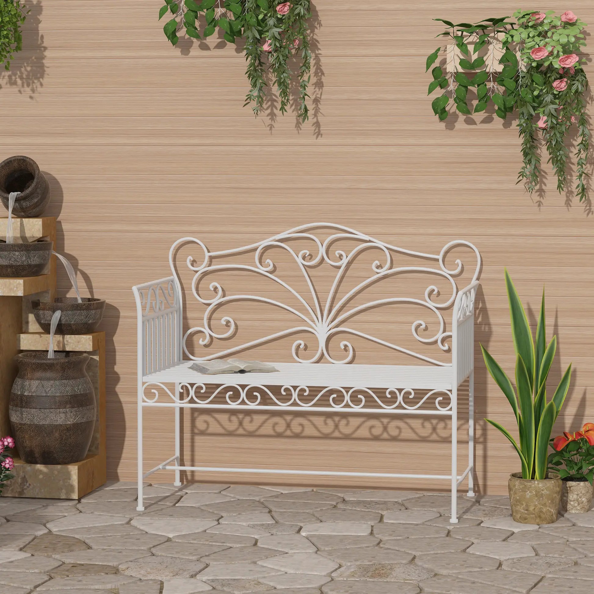 Decorative white metal bench in a garden setting with plants and a water feature.
