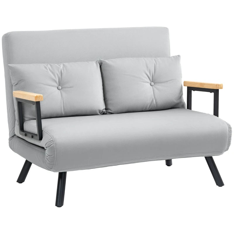Gray sofa bed with wooden armrests and black legs on a white background