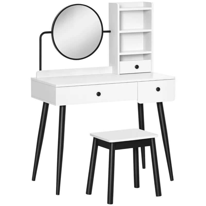White vanity table with round mirror and black legs on a white background