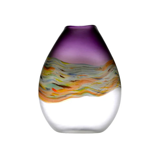 Multicolored glass vase on a white background