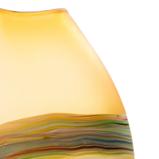 Multicolored glass vase on a white background