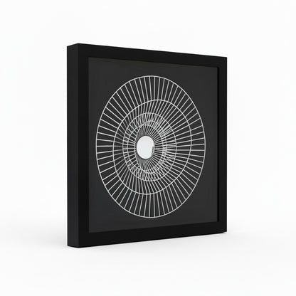 Framed black and white geometric art on a white background