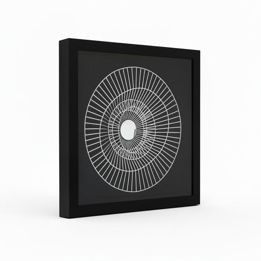 Framed black and white geometric art on a white background