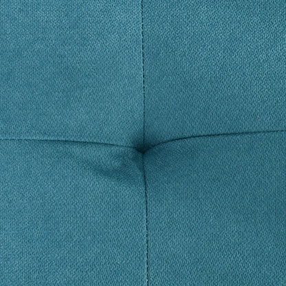 Close-up of a teal upholstered corner with stitching detail