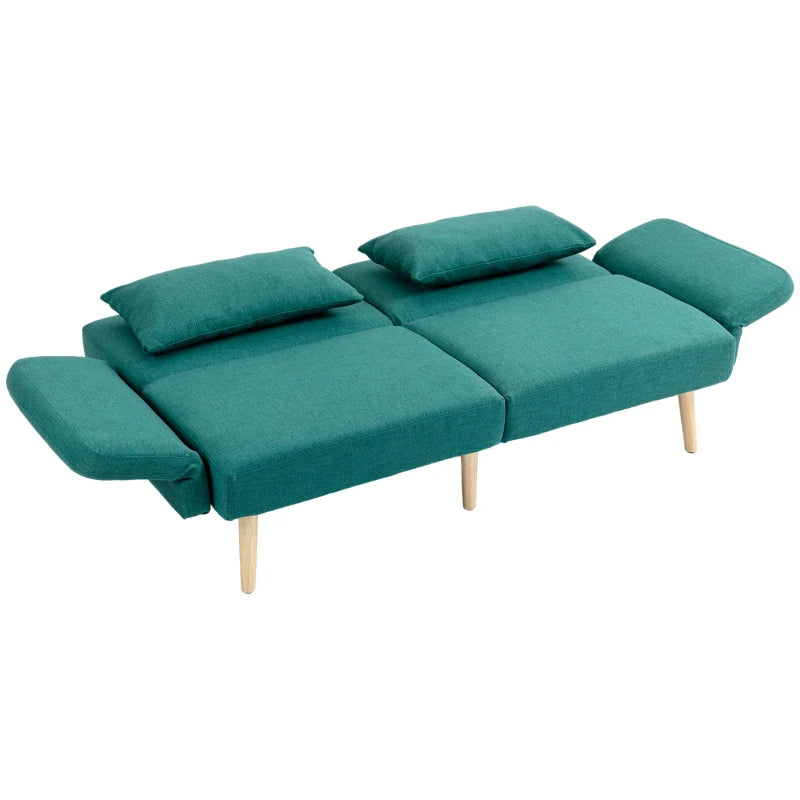 Teal sofa bed with cushions on a white background