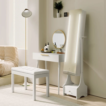 White vanity table with mirror and bench in a room setting