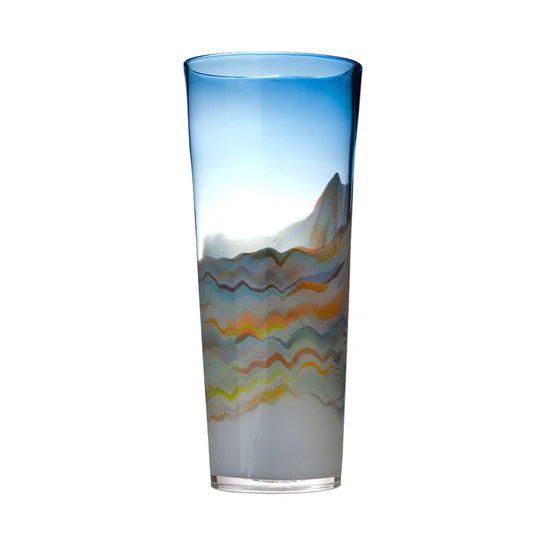 Glass with mountain and wave design on a white background