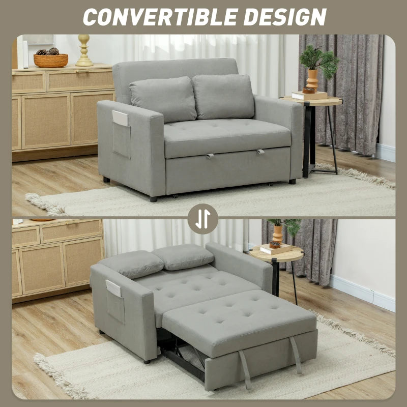 Gray convertible sofa in a living room setting with storage drawers.