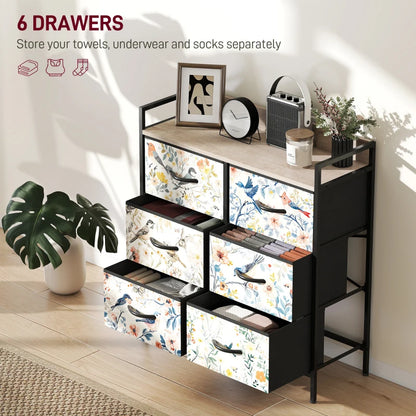 Black dresser with floral-patterned drawers in a room setting.