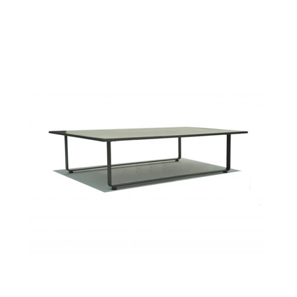 Coffee table with a metal frame and glass top on a white background