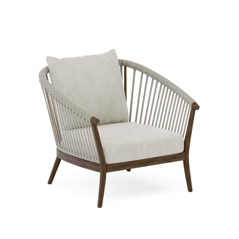 Wicker chair with cushion on a white background